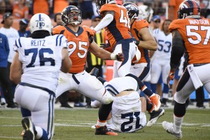 Derek Wolfe (95) of the Denver Broncos reacts to sacking Andrew Luck (12) of the Indianapolis Colts down during the fourth quarter of the Broncos' 34-20 win. The Denver Broncos hosted the Indianapolis Colts on Sunday, September 18, 2016. John Leyba, The Denver Post